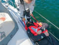 Pull with a safety line: If the person is not conscious, a safety line or harness can be used to move them