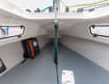 Opening superstructure windows, bunk cushions and stowage pockets are the only comforts below deck