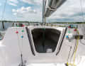 Inside: Halyards and trim equipment are arranged around the companionway. Inside there is a small footwell in front of the berth area