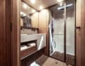 The bathroom at the front surprises with a double washbasin and large shower