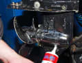Place the tube on the drain plug and press in the oil until ...