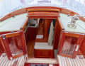 Transparent hinged doors in the heavily modified superstructure, a breakwater and only one winch adorn the cabin superstructure
