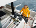 Suboptimal: Winches and stoppers are within reach, but a little too high