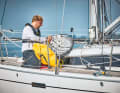 1: The POB-Net comes in a flat bag, in an emergency it is fished out of the back box and hooked into the sea railing