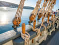 A row of nails on the bulwark, buoys with wooden blocks above and heavy ropes: manoeuvring the gaff sailer, especially hoisting and trimming the large cloths, is a feat of strength
