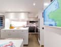 Everyone is delighted that a French chef is cooking on board.