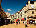 The pedestrian zone of Kotor, the main town in the bay, is still bustling in October