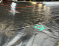 ...laminated between black coloured films