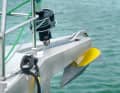 The bowsprit is firmly welded to the deck and hull. The anchor is also attached to it