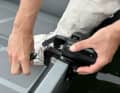 The mounting bracket can be detached from the motor and is attached to the mirror using two tommy screws