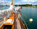 Mooring from the deck can be tedious. A patent mooring hook makes it easier to thread in the mooring line