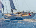 The sweeping stern with the retracted waterline is typical of Polli's lines. The open cockpit is simply huge