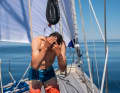 Crew member Florian treats himself to a solar shower on the foredeck of the "Lisa"