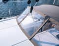 The mainsheet foot block is driven at the front on a cock pot, which replaces the traveller