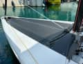 The foredeck is only attached. The carbon fibre canopy gets scorching hot in the sun