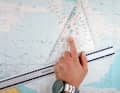 In principle, any straight edge is suitable for moving the triangle, including a fairly simple school ruler if necessary