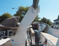 For trailering, the mast and boom together with the sail rest securely on a customised bracket