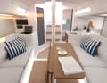 Light finish, bright ambience: Despite the reduced use of wooden surfaces, the First 30 has a very cosy feel. Apart from a navigation table, it lacks nothing in terms of functionality; even the saloon sofas are long and deep enough to serve as berths