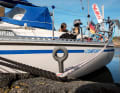 The iron eyes firmly anchored in the rock are ideal for mooring. Springs and long leader lines are attached to the slip