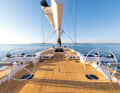 The cockpit is separate from the work area and has no steps up to the foredeck