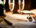 Ceremony. The signing of the contract creates facts, the purchase is sealed. Time to pop the corks