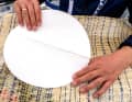 Special patches made from number cloth with additional centre reinforcement are available from sailmakers or specialist dealers. When attaching the patch, the film of the centre reinforcement must also be removed, otherwise the patch will not last long