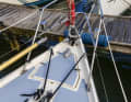On the test ship, the anchor remains in the locker. There is a bow roller, but no winch