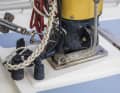 There is also a block of wood screwed into the base of the mast