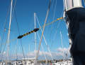 Rig the shock absorber: If the furled genoa swings up on the forestay, the whole mast can start to vibrate. A shock absorber between the mast and genoa provides a remedy