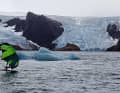 Wingfoiling against an icy backdrop: A member of the crew uses the days in Prince Christian Sound to go surfing in a very special place.