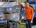 Bedwell and his aluminium "BIG CV2" looking for sponsors during the Southampton Boat Show. Highest bidders get a place above the waterline.