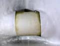 A coat of topcoat covers the laminate. Ensure that the flange area for the drive motor is not soiled by laminate or paint; it must remain smooth.