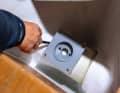 Three holes must be drilled. To mark the holes, place the flange on the pipe from the inside so that the right-hand hole is on the centreline. After drilling ...