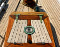 The massive anchor winch is original.