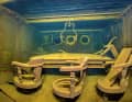 Chairs, a table, above it the frame of a pendant lamp: a glimpse into the wreck of the 1913.