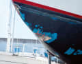 The collision caused a crack in the hull below the waterline, which a local shipyard repaired during the winter.