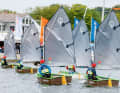 The early bird gets the worm: sailing schools and clubs are ideal for learning how to handle the tiller and sheet - and not just for kids!