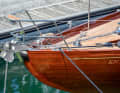 Stainless steel contrasts with the teak deck and flaming mahogany.
