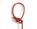 The bowline is used to attach a fixed loop to the end of a line. This can be useful when tying up.