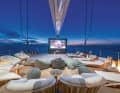 ... relaxing in the open-air cinema.