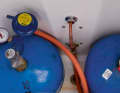 The pipe leads from the gas box to the outside by means of a bulkhead fitting.