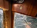 Large gap: The areas where the companionway staircase starts were not covered with sound insulation. The sound enters the lounge unhindered.
