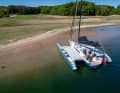 Thanks to the centreboard, it's no problem to go ashore or fall dry. The saildrive is protected by the hull.