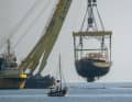 The floating crane brought the "Bayesian" into Termini harbour.