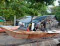 The centre hull is planked with plywood, and the boat builders in the Philippines also use epoxy for the joints.