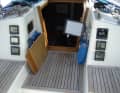 Companionway: The plug-in bulkhead is offset forwards and there is a very deep bridge deck that is not quite level with the dikes