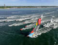 Team Malizia is escorted in the fjord