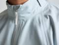The zip at the neck closes, but is also intended for climate control. The collar can also be adjusted using Velcro.