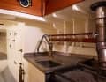 An old coal stove on a yacht in the Herreshoff Museum