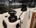 Proven layout. Halyard and sheet winches are also offset in height